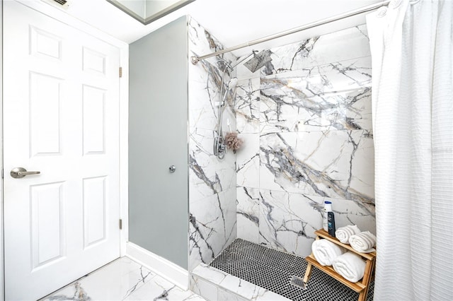 bathroom featuring curtained shower