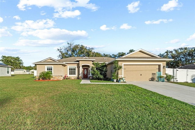 ranch-style house featuring a front yard and a garage