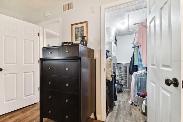 walk in closet featuring hardwood / wood-style flooring