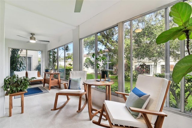 sunroom / solarium with ceiling fan