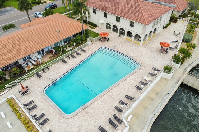 view of swimming pool featuring a patio area