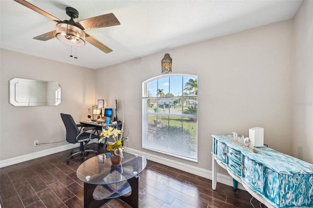 office featuring ceiling fan and dark hardwood / wood-style flooring