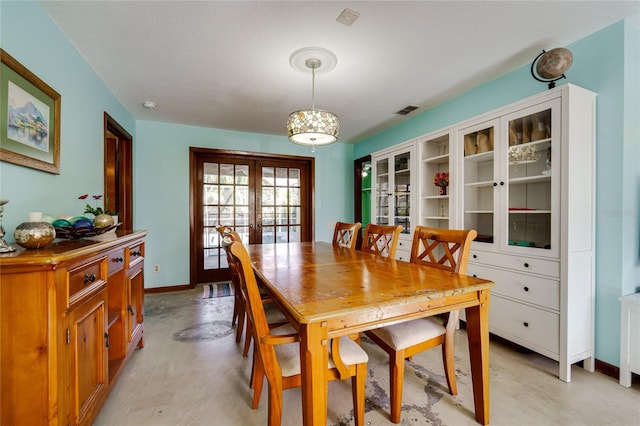 dining area featuring french doors