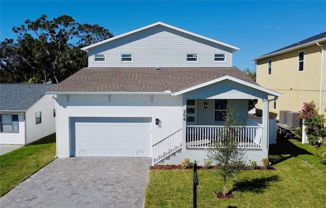 view of front of house featuring central air condition unit, a porch, and a front yard