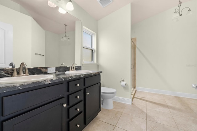 bathroom with tile patterned flooring, toilet, an enclosed shower, and a notable chandelier