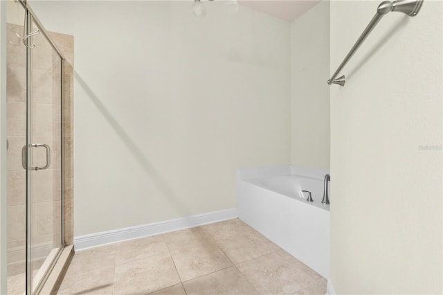 bathroom with plus walk in shower and tile patterned flooring