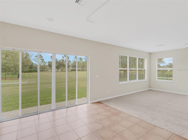 view of carpeted spare room