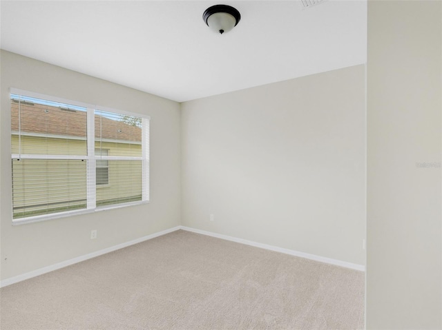 30619 White Bird Ave, Wesley Chapel, FL 33543 - spare room with carpet and baseboards