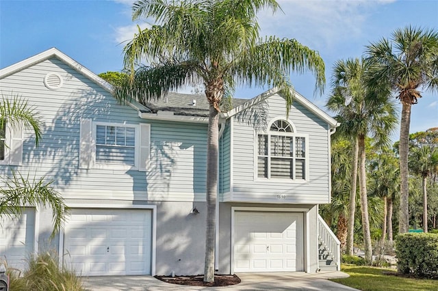 view of front of property featuring a garage