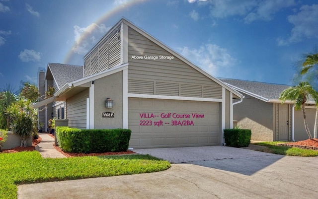 view of side of property featuring a garage