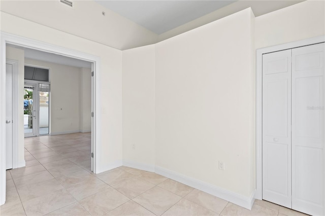 450 Knights Run Ave Unit 407, Tampa, FL 33602 - unfurnished room featuring light tile patterned floors and baseboards