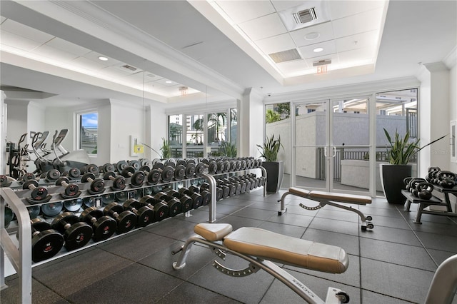 450 Knights Run Ave Unit 407, Tampa, FL 33602 - exercise room featuring a tray ceiling and crown molding