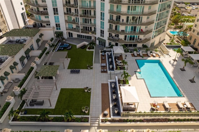 450 Knights Run Ave Unit 407, Tampa, FL 33602 - drone / aerial view of a pool area and apartment complex