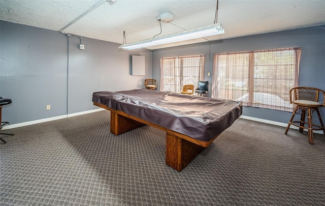 game room featuring billiards, a textured ceiling, carpet flooring, and baseboards