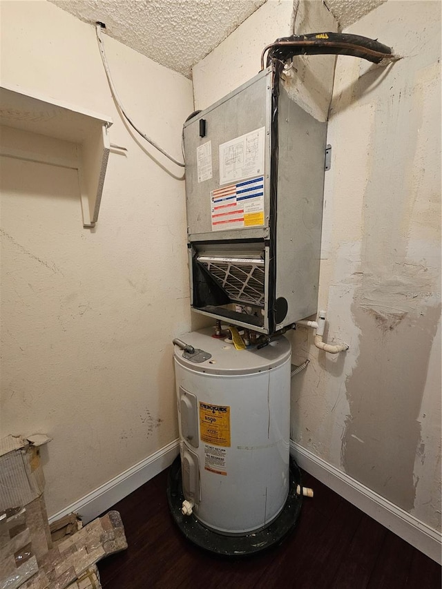 utility room with electric water heater