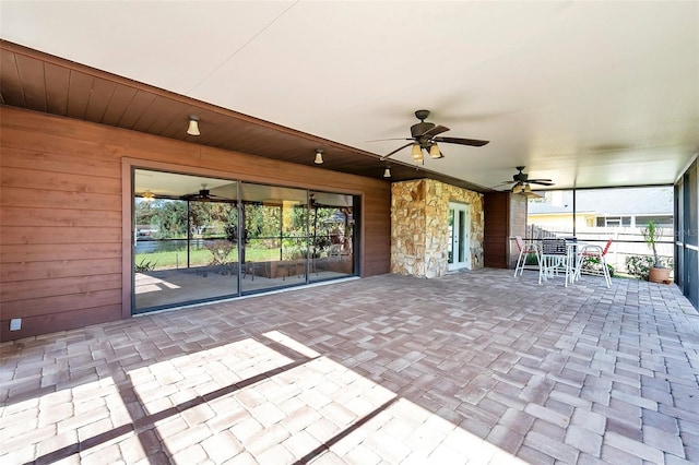 view of patio / terrace featuring ceiling fan