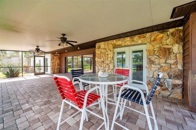 view of patio featuring ceiling fan