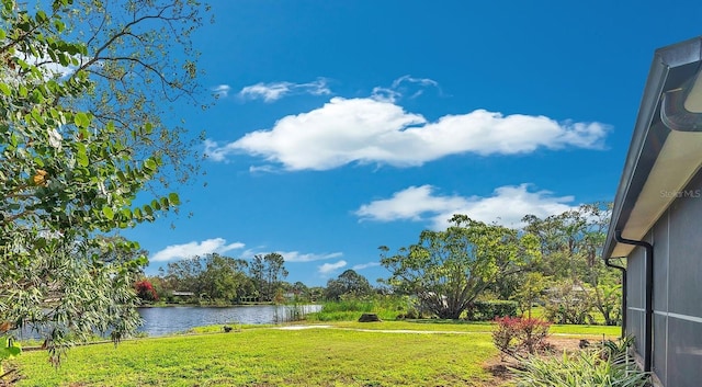 view of yard featuring a water view