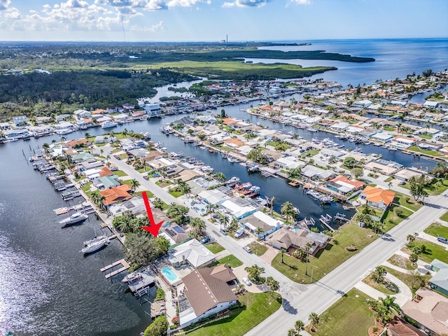 bird's eye view with a water view