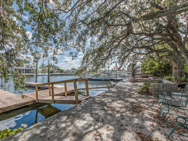 dock area featuring a water view