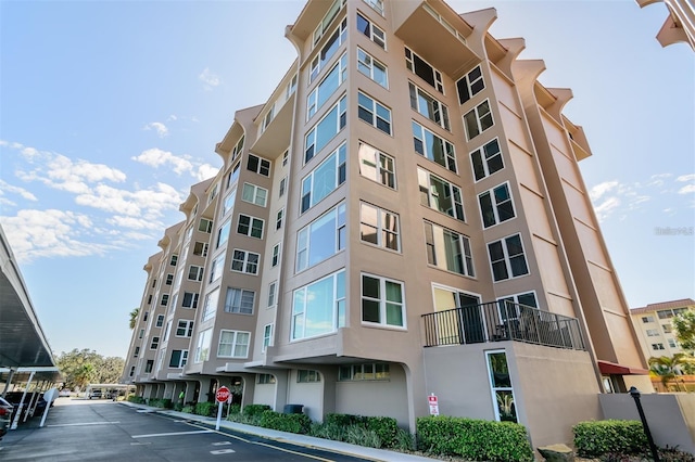 632 Edgewater Dr Unit 532, Dunedin, FL 34698 - view of apartment building / complex featuring uncovered parking