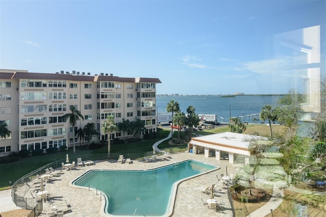 632 Edgewater Dr Unit 532, Dunedin, FL 34698 - community pool with a water view and a patio area