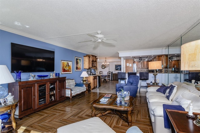 632 Edgewater Dr Unit 532, Dunedin, FL 34698 - living area featuring a ceiling fan, a chandelier, a textured ceiling, and crown molding