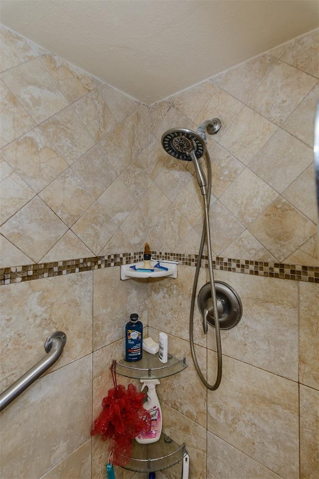 room details with a tile shower