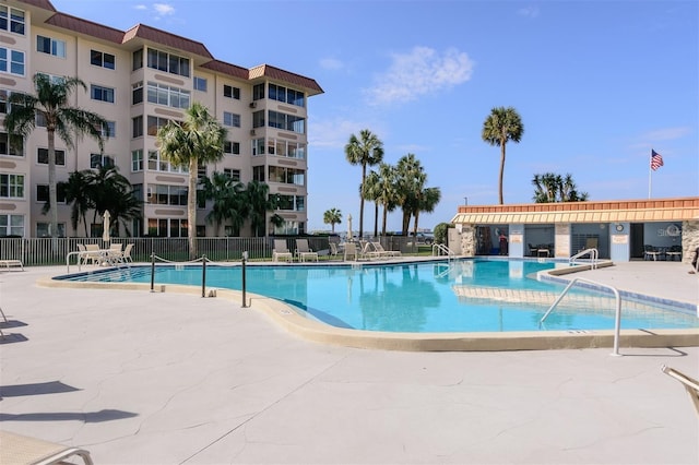 view of swimming pool featuring a patio area