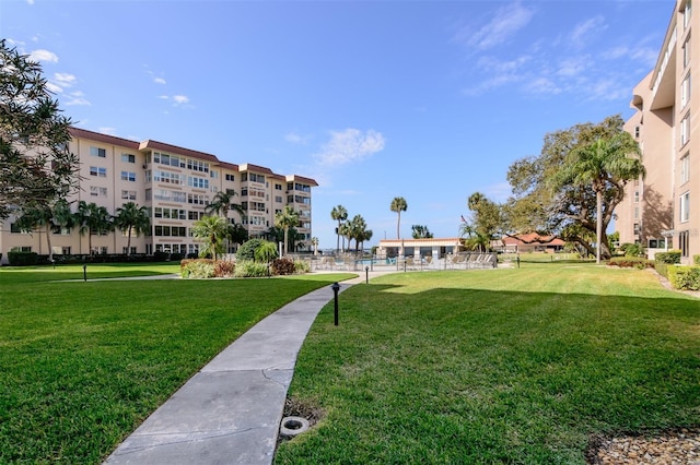 view of community featuring a lawn