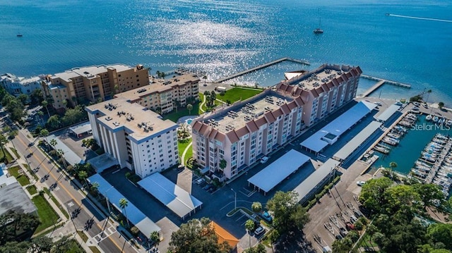 632 Edgewater Dr Unit 532, Dunedin, FL 34698 - drone / aerial view of a nearby body of water and apartment complex / building
