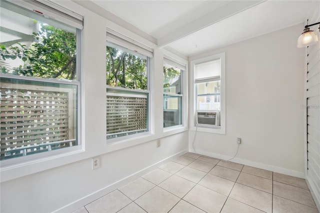 unfurnished sunroom with cooling unit