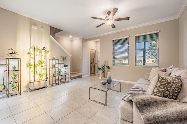 tiled living room featuring ceiling fan and crown molding