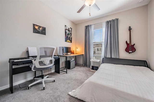 bedroom with ceiling fan and light colored carpet