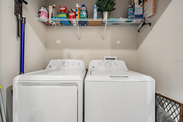 laundry room featuring independent washer and dryer