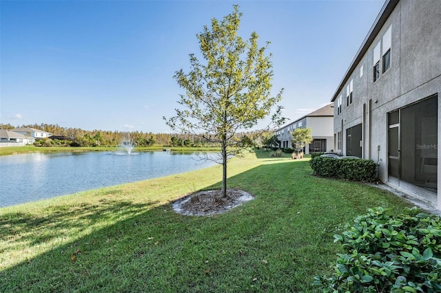 view of yard with a water view