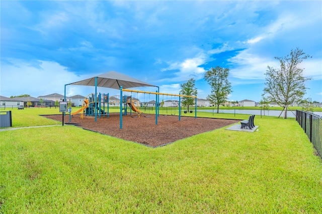 view of play area with a yard