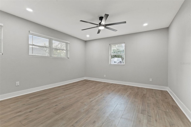 unfurnished room with light hardwood / wood-style floors and ceiling fan