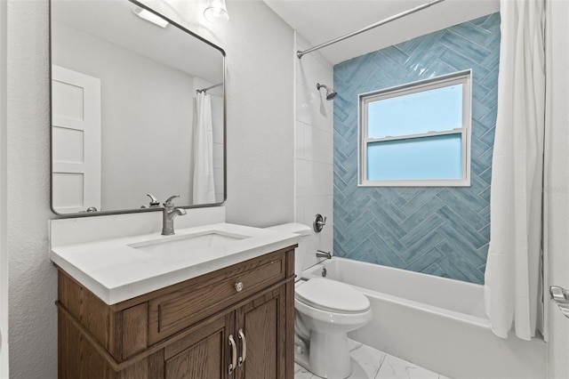 full bathroom with vanity, shower / tub combo, and toilet