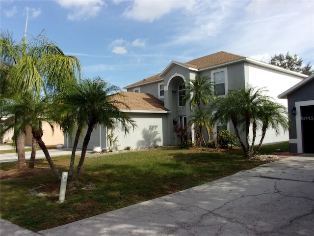 view of front facade featuring a front yard