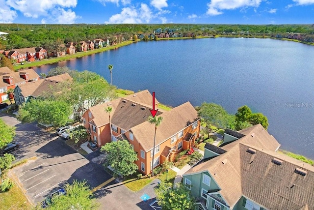 drone / aerial view with a water view