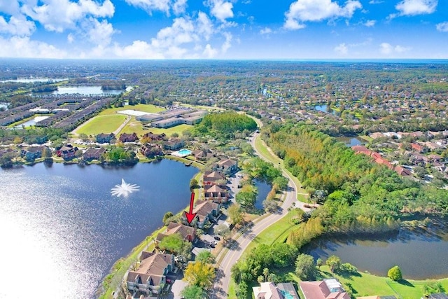 bird's eye view with a water view