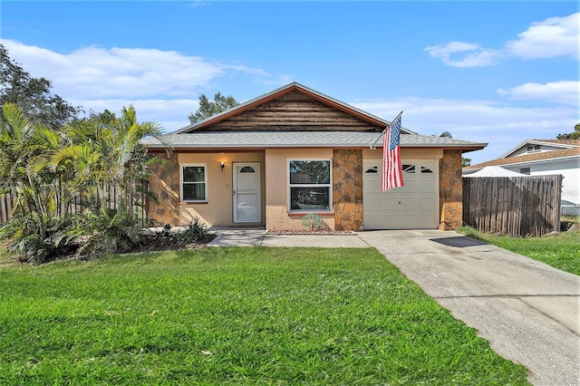 bungalow-style house with a garage and a front lawn