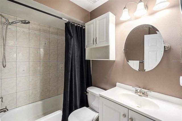 full bathroom with vanity, toilet, and shower / bath combo