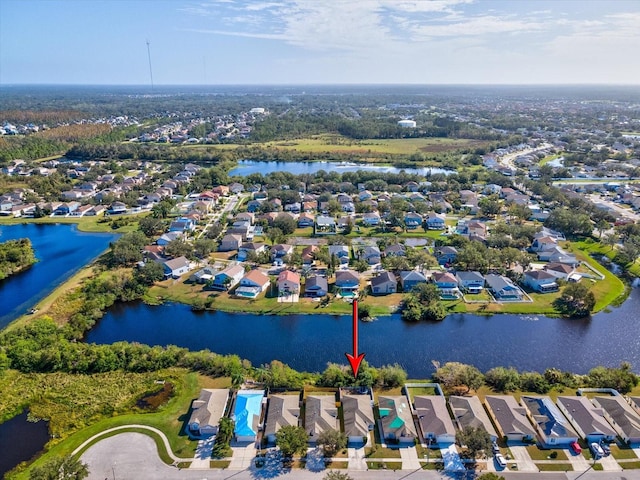 bird's eye view with a water view