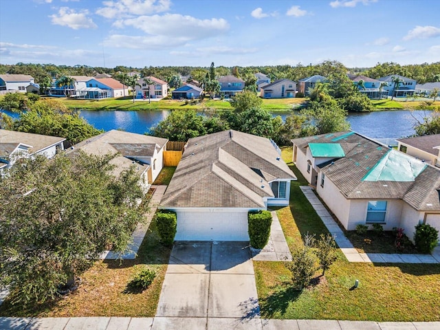 bird's eye view with a water view