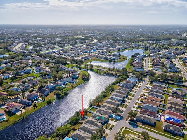 drone / aerial view with a water view