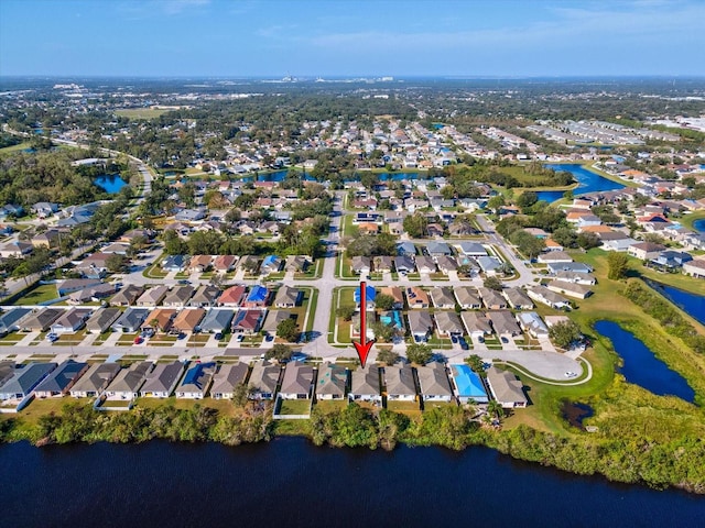 birds eye view of property featuring a water view