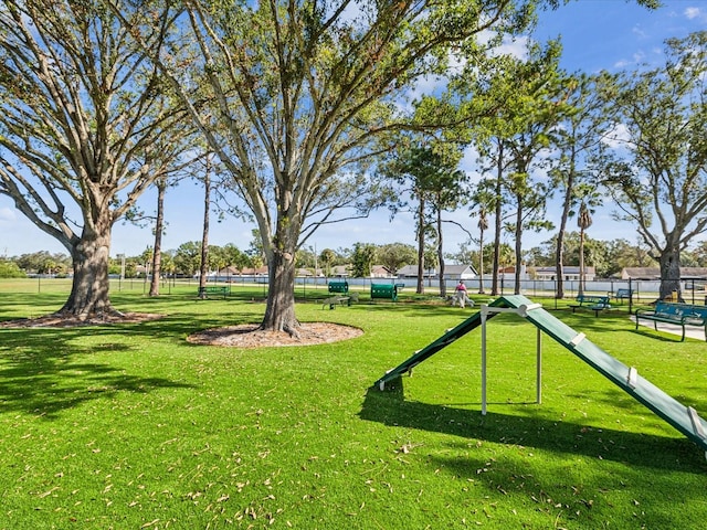 surrounding community featuring a lawn