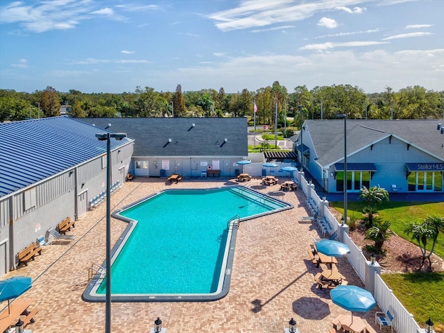 view of swimming pool featuring a patio